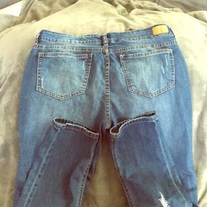 Distressed vintage peg style jeans